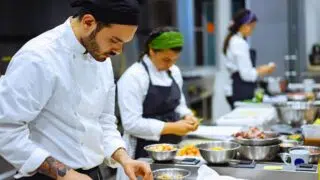 restaurant employees plating meals