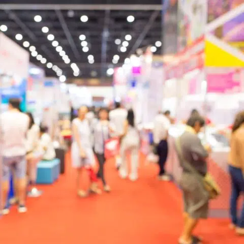 people on the trade show floor