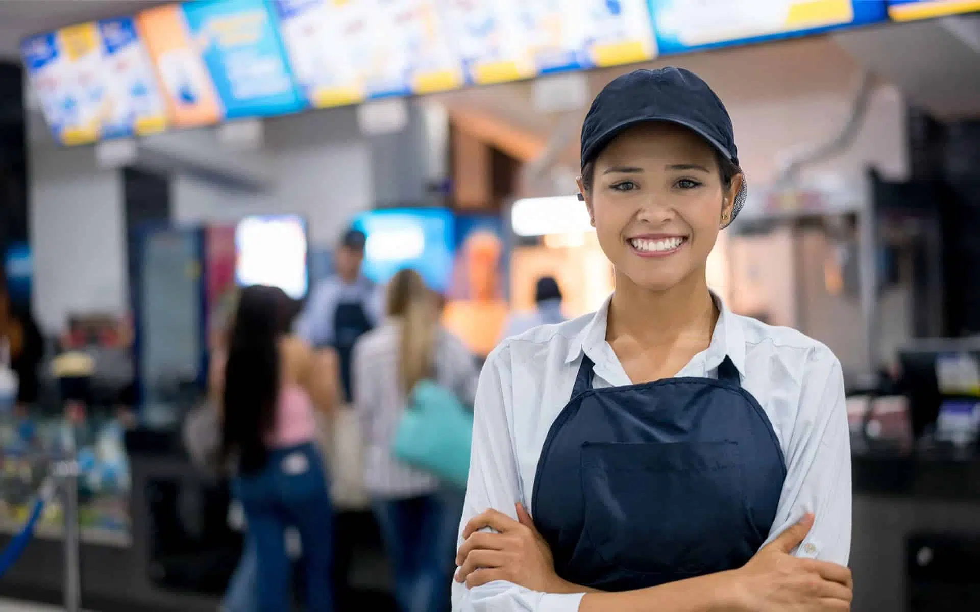 happy employee in a fast food store